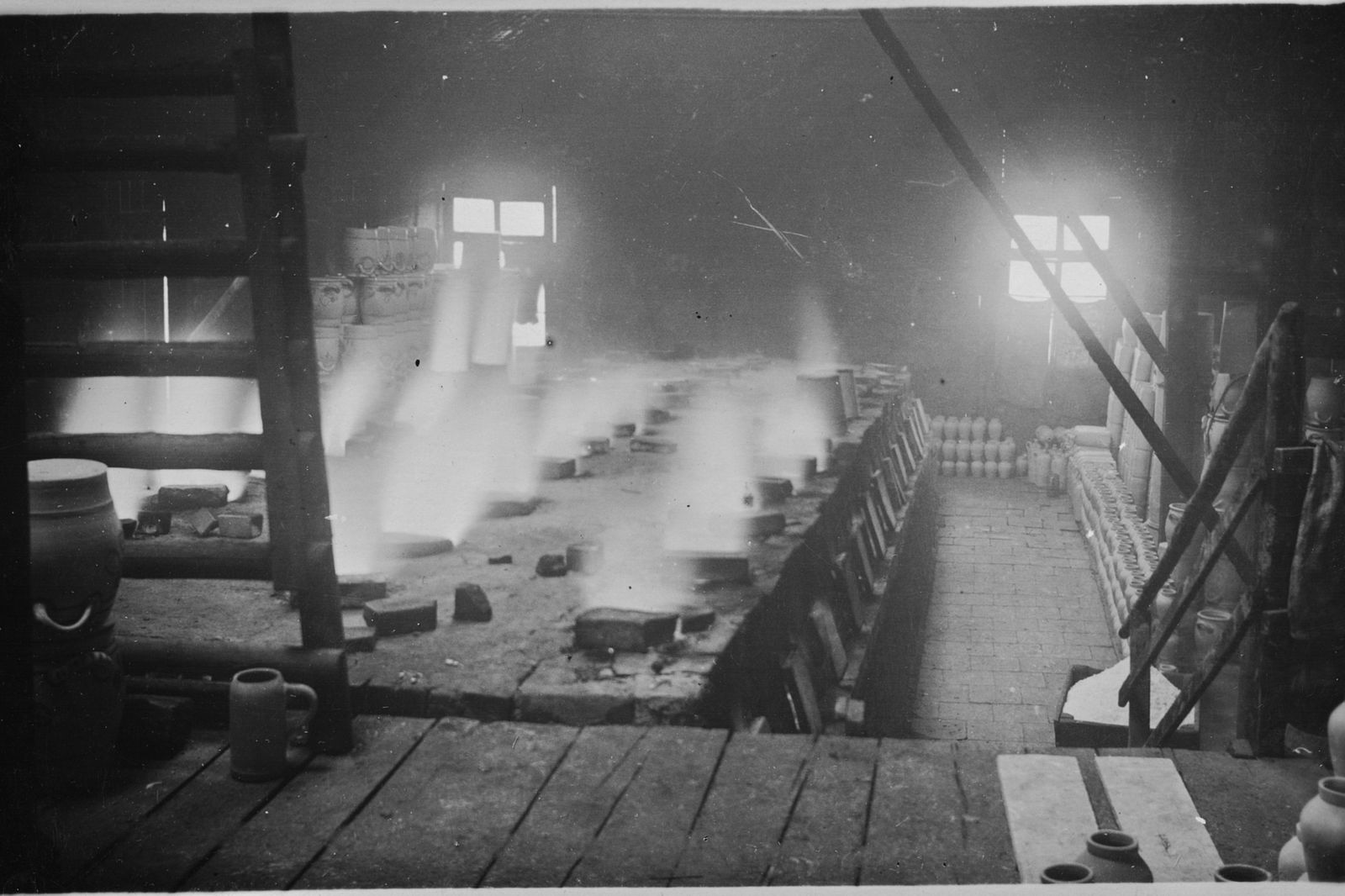 Historisches Bild von einem Kannenofen aus der Erz&auml;hlung Kleines Feuer von Roland Giefer